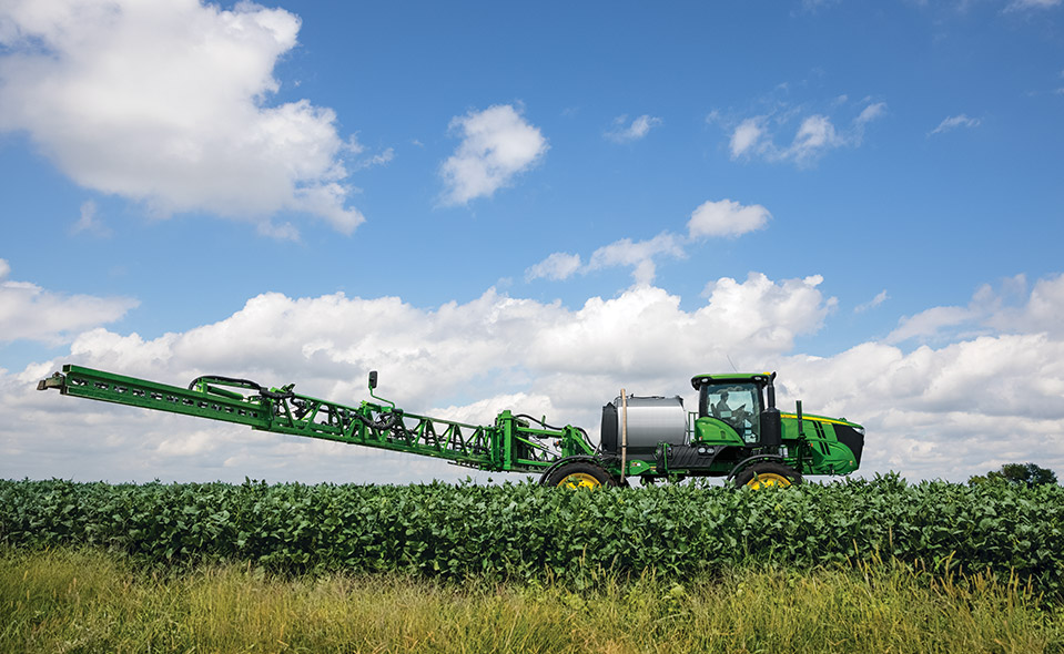 John Deere combine in field